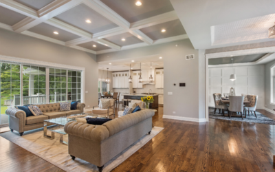 Beautiful living room with hardwood floors, coffered ceiling, and modern furnishings.